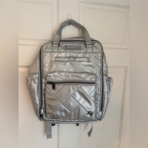 Lug Voyager Backpack in Metallic Silver with Rainbow Icepop Stitching